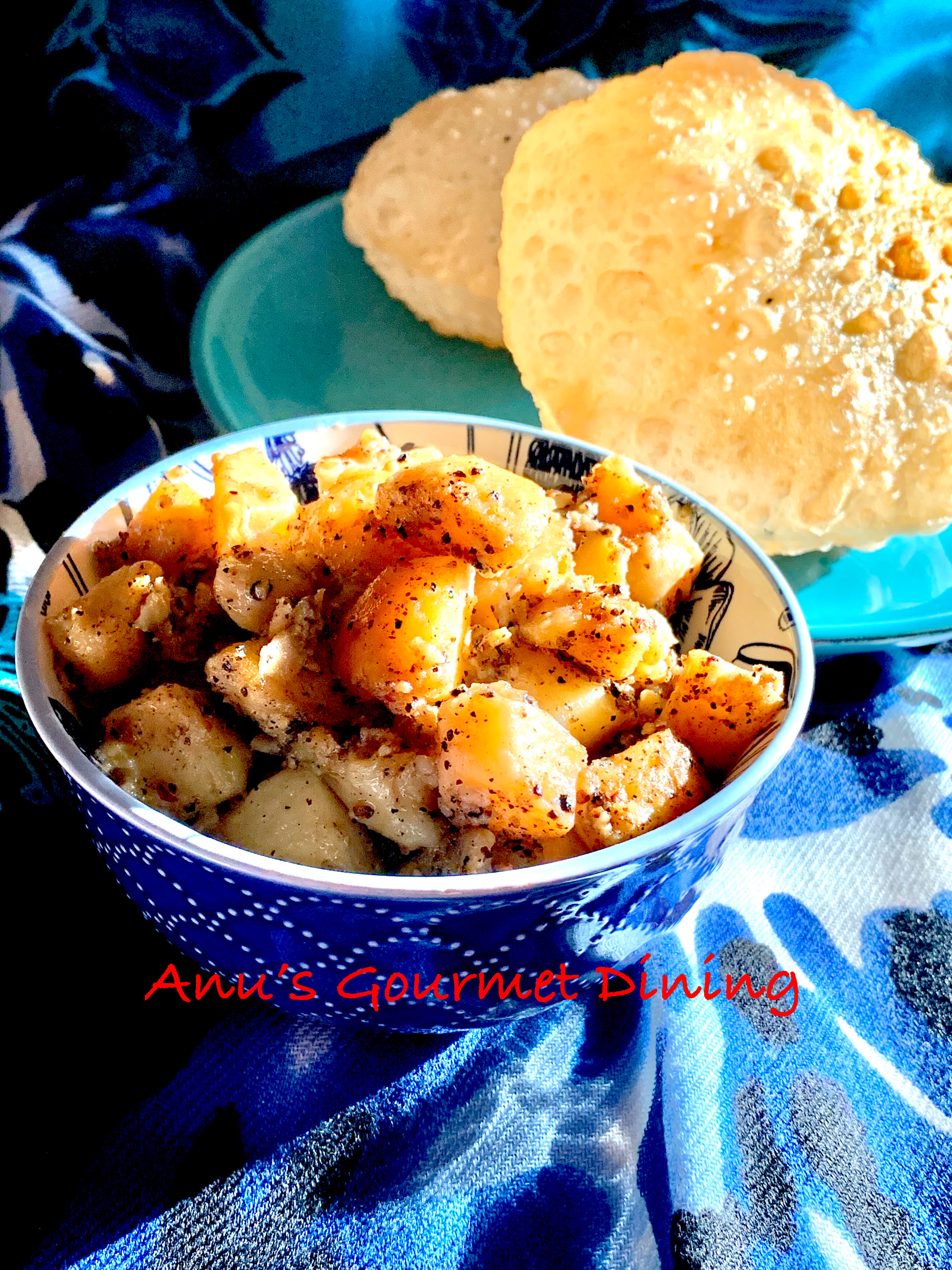 Aaloo Morich & Kaalo Jeere’r Loochi | Aaloo-Kaali Mirch & Kalaunji Waale Poori Recipe Aaloo Morich & Kaalo Jeere’r Loochi | Aaloo-Kaali Mirch & Kalaunji Waale Poori Recipe